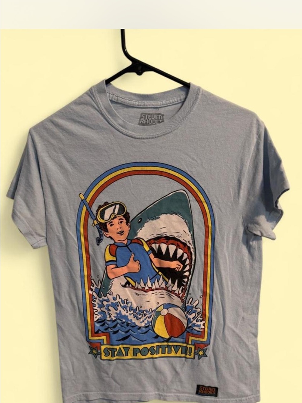 Stay Positive Shark Graphic Tee — Light Blue by Steven Rhodes
